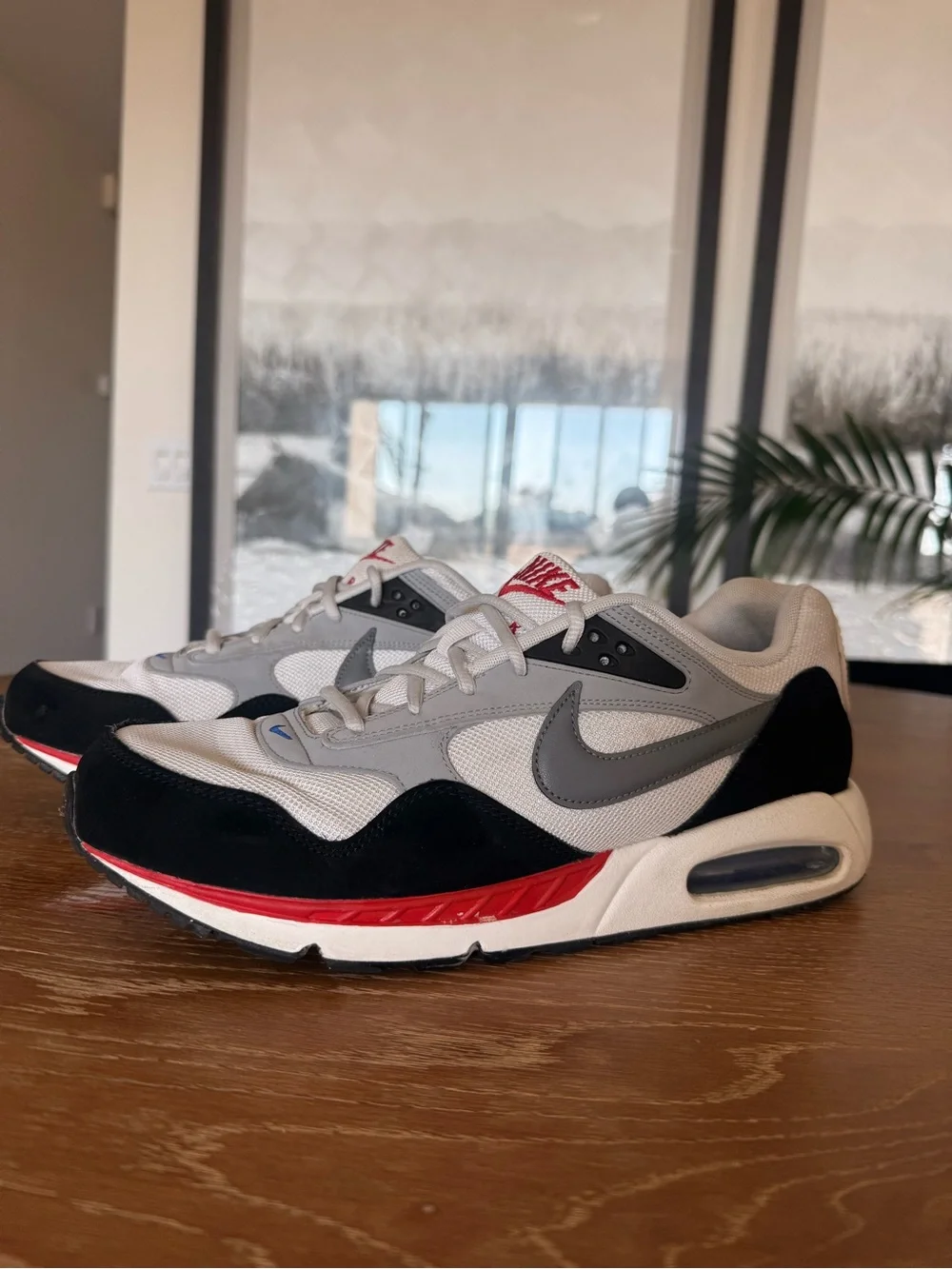 Nike Men’s White, Black and Gray Sneakers with Red Accents